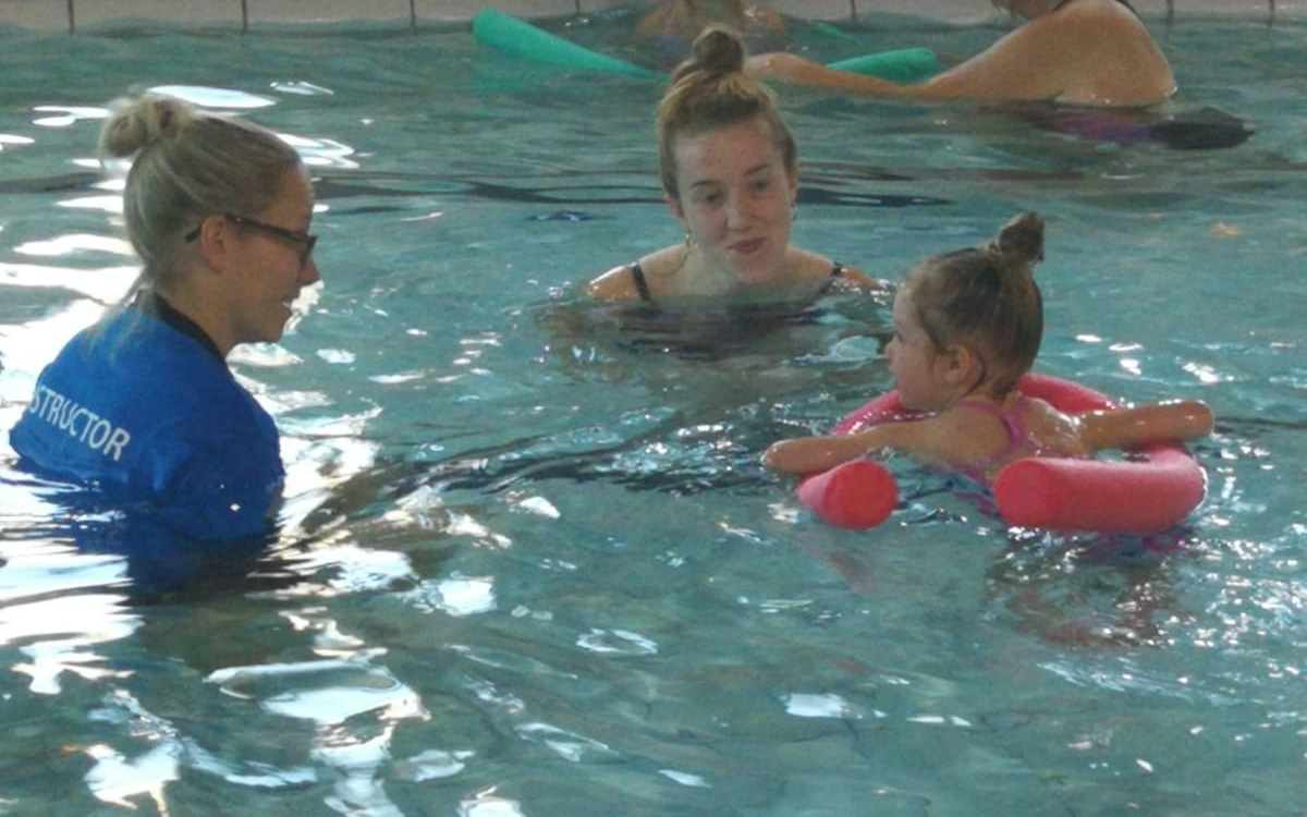 Child in swimming lesson