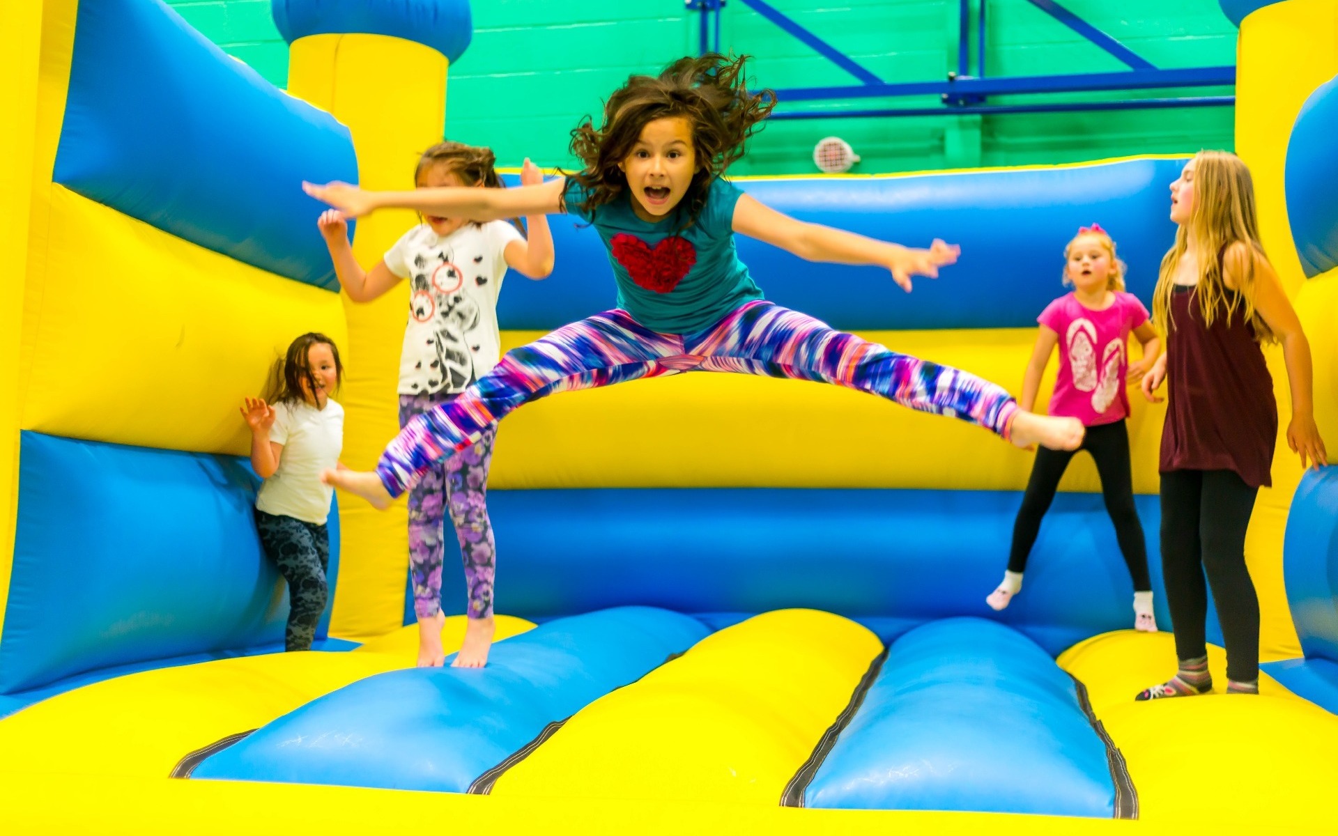 Girls on bouncy castle