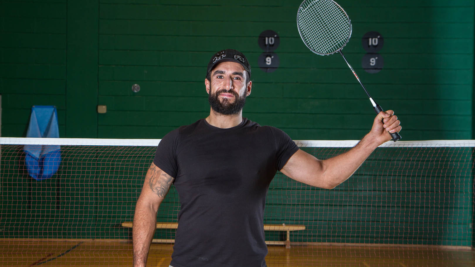 Man with badminton racket